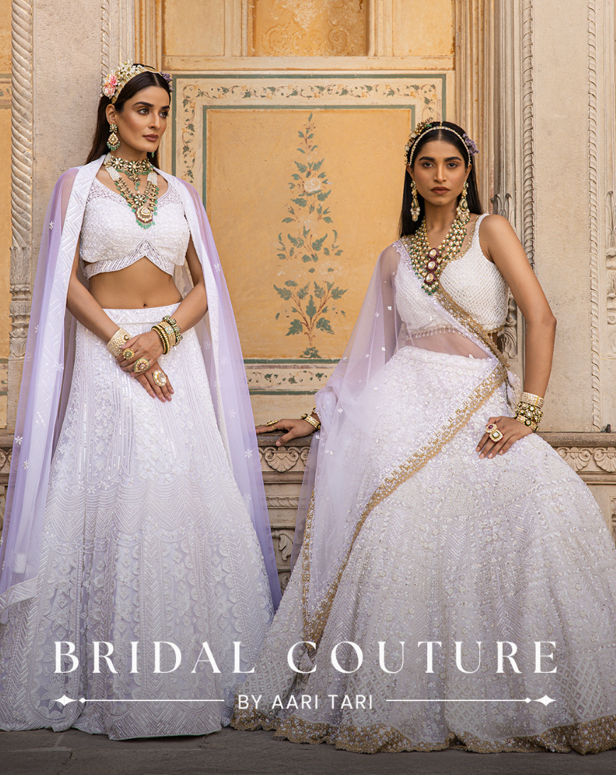 Aari Tari Bridal Couture campaign with two models in white lehengas