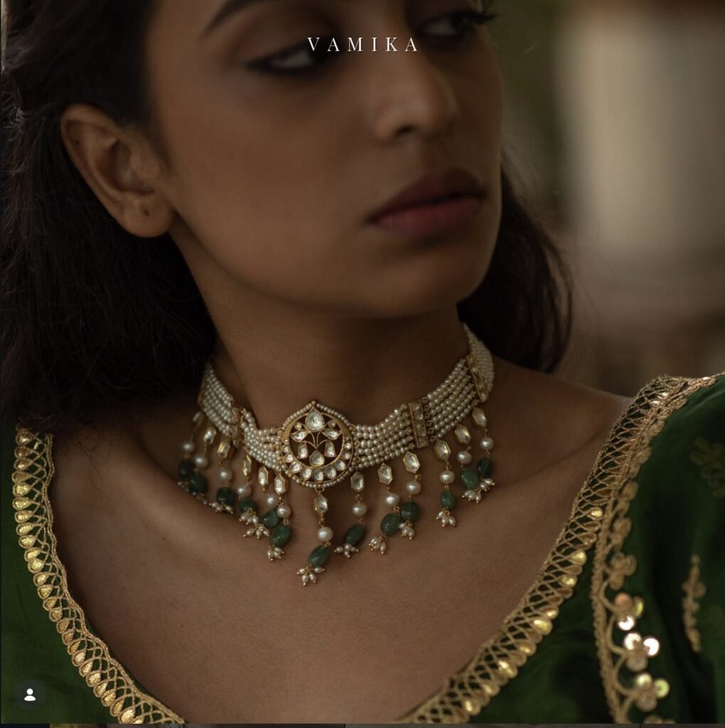 Vamika Silver choker necklace with green beads on a model